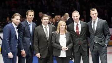 Nov 14, 2014; Toronto, Ontario, CAN; Hockey Hall of Fame inductees (left to right) Peter Forsberg and Mike Modano and Bill McCreary and Line Burns (wife of Pat Burns) and Dominik Hasek and Rob Blake prior to a game between the Pittsburgh Penguins and Toronto Maple Leafs at the Air Canada Centre. Mandatory Credit: John E. Sokolowski-USA TODAY Sports