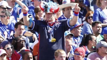 Sep 8, 2013; Orchard Park, NY, USA; A Buffalo Bills fan signals a first down during the game between the Buffalo Bills and the New England Patriots at Ralph Wilson Stadium. Patriots beat the Bills 23-21. Mandatory Credit: Kevin Hoffman-USA TODAY Sports