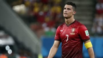 Jun 22, 2014; Manaus, Amazonas, BRAZIL; Portugal forward Cristiano Ronaldo (7) reacts to missing a shot during the second half of their 2-2 tie with the United States in a 2014 World Cup game at Arena Amazonia. Mandatory Credit: Winslow Townson-USA TODAY Sports