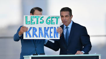 SEATTLE, WASHINGTON - JULY 21: Former NHL player Dominic Moore (L) and broadcaster Chris Fowler host the 2021 NHL Expansion Draft at Gas Works Park on July 21, 2021 in Seattle, Washington. The Kracken is the National Hockey League's newest franchise and will begin play in October 2021. (Photo by Alika Jenner/Getty Images)