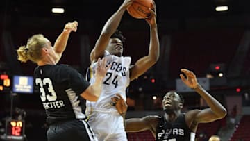 LAS VEGAS, NV - JULY 07: Alize Johnson #24 of the Indiana Pacers shoots against Jeff Ledbetter #33 and Amida Brimah #37 of the San Antonio Spurs during the 2018 NBA Summer League at the Thomas & Mack Center on July 7, 2018 in Las Vegas, Nevada. NOTE TO USER: User expressly acknowledges and agrees that, by downloading and or using this photograph, User is consenting to the terms and conditions of the Getty Images License Agreement. (Photo by Sam Wasson/Getty Images)