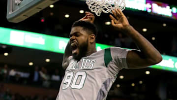 BOSTON, MA - APRIL 13: Amir Johnson #90 of the Boston Celtics dunks in the third quarter against the Miami Heat at TD Garden on April 13, 2016 in Boston, Massachusetts. NOTE TO USER: User expressly acknowledges and agrees that, by downloading and/or using this photograph, user is consenting to the terms and conditions of the Getty Images License Agreement. (Photo by Mike Lawrie/Getty Images)