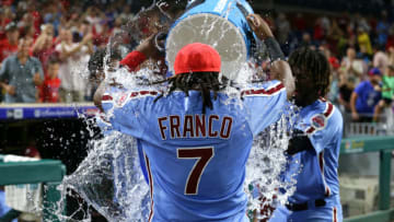 PHILADELPHIA, PA - AUGUST 2: Maikel Franco #7 of the Philadelphia Phillies is dosed with water after hitting a game winning walk-off three-run home run in the ninth inning during a game against the Miami Marlins at Citizens Bank Park on August 2, 2018 in Philadelphia, Pennsylvania. The Phillies won 5-2. (Photo by Hunter Martin/Getty Images)