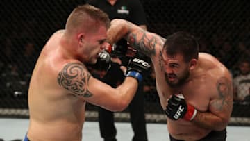 SAO PAULO, BRAZIL - SEPTEMBER 22: (R-L) Augusto Sakai of Brazil punches Chase Sherman in their heavyweight bout during the UFC Fight Night event at Ibirapuera Gymnasium on September 22, 2018 in Sao Paulo, Brazil. (Photo by Buda Mendes/Zuffa LLC/Zuffa LLC via Getty Images)