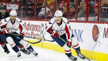 Dec 31, 2015; Raleigh, NC, USA; Washington Capitals forward Andre Burakovsky (65) skates with the puck against the Carolina Hurricanes at PNC Arena. The Carolina Hurricanes defeated the Washington Capitals 4-2. Mandatory Credit: James Guillory-USA TODAY Sports