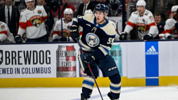 Nov 20, 2022; Columbus, Ohio, USA; Columbus Blue Jackets right wing Yegor Chinakhov (59) passes the puck in the first period against the Florida Panthers at Nationwide Arena. Mandatory Credit: Gaelen Morse-USA TODAY Sports