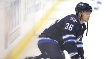 Sep 29, 2016; Winnipeg, Manitoba, CAN; Winnipeg Jets defenceman Josh Morrissey (36) stretches prior to the game against the Minnesota Wild during a preseason hockey game at MTS Centre. Mandatory Credit: Bruce Fedyck-USA TODAY Sports