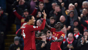 LIVERPOOL, ENGLAND - NOVEMBER 10: Sadio Mane of Liverpool is congratulated by Virgil Van Dijk after scoring the third goal during the Premier League match between Liverpool FC and Manchester City at Anfield on November 10, 2019 in Liverpool, United Kingdom. (Photo by Laurence Griffiths/Getty Images)