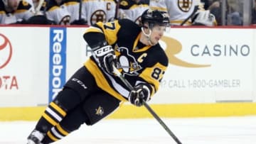 Dec 18, 2015; Pittsburgh, PA, USA; Pittsburgh Penguins center Sidney Crosby (87) skates with the puck against the Boston Bruins during the first period at the CONSOL Energy Center. Mandatory Credit: Charles LeClaire-USA TODAY Sports