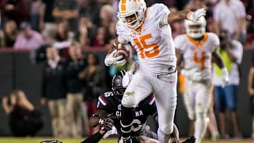 Oct 29, 2016; Columbia, SC, USA; Tennessee Volunteers wide receiver Jauan Jennings (15) steps over South Carolina Gamecocks defensive back D.J. Smith (24) in the second half at Williams-Brice Stadium. Mandatory Credit: Jeff Blake-USA TODAY Sports