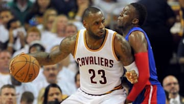 Apr 17, 2016; Cleveland, OH, USA; Cleveland Cavaliers forward LeBron James (23) works against Detroit Pistons guard Reggie Jackson (1) during the second quarter in game one of the first round of the NBA Playoffs at Quicken Loans Arena. Mandatory Credit: Ken Blaze-USA TODAY Sports