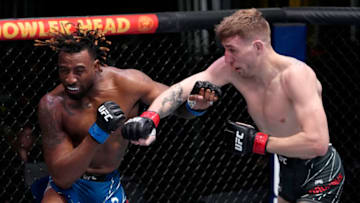 LAS VEGAS, NEVADA - FEBRUARY 19: (R-L) Kyle Daukaus punches Jamie Pickett in their middleweight fight during the UFC Fight Night event at UFC APEX on February 19, 2022 in Las Vegas, Nevada. (Photo by Jeff Bottari/Zuffa LLC)
