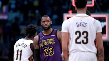 LOS ANGELES, CALIFORNIA - DECEMBER 21: LeBron James #23 of the Los Angeles Lakers reacts in front of Anthony Davis #23 of the New Orleans Pelicans after a 112-104 Laker win at Staples Center on December 21, 2018 in Los Angeles, California. NOTE TO USER: User expressly acknowledges and agrees that, by downloading and or using this photograph, User is consenting to the terms and conditions of the Getty Images License Agreement. (Photo by Harry How/Getty Images)