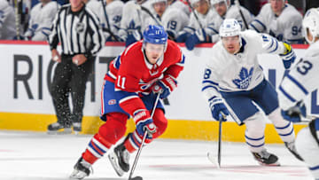 MONTREAL, QUEBEC - OCTOBER 26: Brendan Gallagher #11 of the Montreal Canadiens skating up the ice in control of the puck with Andreas Johnsson #18 of the Toronto Maple Leafs trying to stop him at Centre Bell on October 26, 2019 in Montreal, Quebec. (Photo by Stephane Dube /Getty Images)