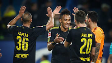 HAMBURG, GERMANY - SEPTEMBER 20: Pierre Emerick Aubameyang and Maximilian Philipp (L-R) of Dortmund celebrate after the Bundesliga match between Hamburger SV and Borussia Dortmund at Volksparkstadion on September 20, 2017 in Hamburg, Germany. (Photo by Oliver Hardt/Bundesliga/DFL via Getty Images )