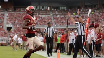Oct 15, 2016; Norman, OK, USA; Oklahoma Sooners wide receiver Dede Westbrook (11) scores a touchdown against the Kansas State Wildcats during the third quarter at Gaylord Family - Oklahoma Memorial Stadium. Mandatory Credit: Mark D. Smith-USA TODAY Sports