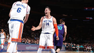 NEW YORK, NY - JANUARY 27: Willy Hernangomez #14 and Kristaps Porzingis #6 of the New York Knicks high five each other during the game against the Charlotte Hornets on January 27, 2017 at Madison Square Garden in New York City, New York. Copyright 2017 NBAE (Photo by Nathaniel S. Butler/NBAE via Getty Images)