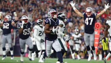 FOXBOROUGH, MA - AUGUST 16: James White #28 of the New England Patriots scores a touchdown in the second quarter against the Philadelphia Eagles during the preseason game at Gillette Stadium on August 16, 2018 in Foxborough, Massachusetts. (Photo by Tim Bradbury/Getty Images)