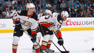 SAN JOSE, CA - MARCH 18: Hampus Lindholm #47 and Ryan Getzlaf #15 of the Anaheim Ducks face off against the San Jose Sharks at SAP Center on March 18, 2017 in San Jose, California. (Photo by Rocky W. Widner/NHL/Getty Images)
