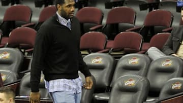 Mar 8, 2013; Cleveland, OH, USA; NBA free agent Greg Oden walks along the court after the game between the Memphis Grizzlies and Cleveland Cavaliers 103-92 at Quicken Loans Arena. Mandatory Credit: David Richard-USA TODAY Sports