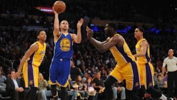 January 5, 2016; Los Angeles, CA, USA; Golden State Warriors guard Stephen Curry (30) moves to the basket against Los Angeles Lakers center Roy Hibbert (17) during the first half at Staples Center. Mandatory Credit: Gary A. Vasquez-USA TODAY Sports