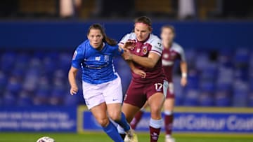 BIRMINGHAM, ENGLAND - NOVEMBER 17: Lisa Robertson of Birmingham and Melisa Filis of West Ham in action during the FA Women's Continental Tyres League Cup match between Birmingham City and West Ham United at St Andrew's Trillion Trophy Stadium on November 17, 2021 in Birmingham, England. (Photo by Michael Regan/Getty Images)