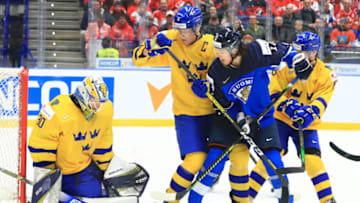OSTRAVA, CZECH REPUBLIC - JANUARY 5, 2020: Sweden's goaltender Hugo Alnefelt, players Adam Ginning (2nd L), Mattias Norlinder (R), and Finland's Eemil Erholtz (2nd R) in the 2020 IIHF World Junior Ice Hockey Championship bronze medal match between Sweden and Finland at Ostravar Arena. Peter Kovalev/TASS (Photo by Peter KovalevTASS via Getty Images)