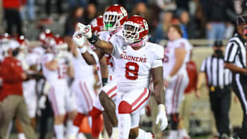 LUBBOCK, TEXAS - OCTOBER 31: Defensive lineman Perrion Winfrey #8 of the Oklahoma Sooners signals after the Sooners recovered a fumble during the first half of the college football game against the Texas Tech Red Raiders at Jones AT&T Stadium on October 31, 2020 in Lubbock, Texas. (Photo by John E. Moore III/Getty Images)