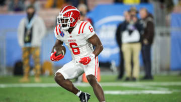PASADENA, CALIFORNIA - NOVEMBER 25: Nathaniel Frazier #6 of the Mater Dei Monarchs runs with the ball against the St. John Bosco Braves during the 2022 CIF-SS-Ford Division 1 Football Championship at Rose Bowl Stadium on November 25, 2022 in Pasadena, California. (Photo by Meg Oliphant/Getty Images)