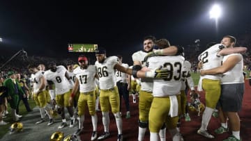 LOS ANGELES, CA - NOVEMBER 24: Notre Dame Fighting Irish players celebrate after defeating USC Trojans 24-17 at Los Angeles Memorial Coliseum on November 24, 2018 in Los Angeles, California. (Photo by Kevork Djansezian/Getty Images)