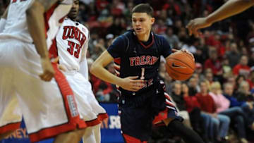 Jan 25, 2014; Las Vegas, NV, USA; Fresno State Bulldogs guard Tyler Johnson dribbles into the UNLV Runnin