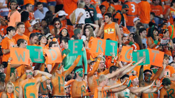 MIAMI, FL - OCTOBER 9: Miami Hurricanes fans hold signs that spell out 'wide right' prior to the game against the Florida State Seminoles on October 9, 2010 at Sun Life Stadium in Miami, Florida. The Seminoles defeated the Hurricanes 45-17. (Photo by Joel Auerbach/Getty Images)