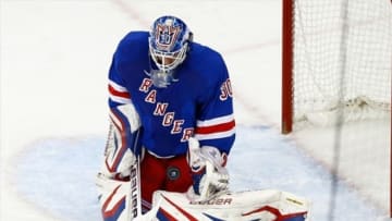 May 23, 2013; New York, NY, USA; New York Rangers goalie Henrik Lundqvist (30) makes a save against the Boston Bruins during the second period in game four of the second round of the 2013 Stanley Cup Playoffs at Madison Square Garden. Mandatory Credit: Debby Wong-USA TODAY Sports