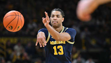 Jan 12, 2023; Iowa City, Iowa, USA; Michigan Wolverines guard Jett Howard (13) controls the ball against the Iowa Hawkeyes during the first half at Carver-Hawkeye Arena. Mandatory Credit: Jeffrey Becker-USA TODAY Sports