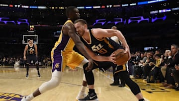 Dec 27, 2016; Los Angeles, CA, USA; Los Angeles Lakers forward Luol Deng (left) defends against Utah Jazz forward Gordon Hayward (20) during the third quarter at Staples Center. Mandatory Credit: Richard Mackson-USA TODAY Sports