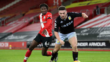 SOUTHAMPTON, ENGLAND - JANUARY 30: John McGinn of Aston Villa is challenged by Alex Jankewitz of Southampton during the Premier League match between Southampton and Aston Villa at St Mary's Stadium on January 30, 2021 in Southampton, England. Sporting stadiums around the UK remain under strict restrictions due to the Coronavirus Pandemic as Government social distancing laws prohibit fans inside venues resulting in games being played behind closed doors. (Photo by Naomi Baker/Getty Images)