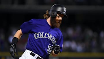 Aug 15, 2016; Denver, CO, USA; Colorado Rockies center fielder Charlie Blackmon (19) rounds the bases after his solo home run in the fourth inning against the Washington Nationals at Coors Field. The Nationals defeated the Rockies 5-4. Mandatory Credit: Ron Chenoy-USA TODAY Sports