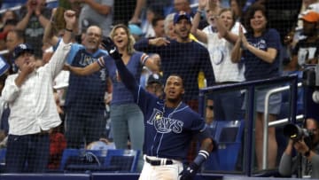 Jun 22, 2021; St. Petersburg, Florida, USA; Tampa Bay Rays infielder Wander Franco (5) celebrates with the fans as he hits a 3-run home run during the fifth inning against the Boston Red Sox at Tropicana Field. Mandatory Credit: Kim Klement-USA TODAY Sports
