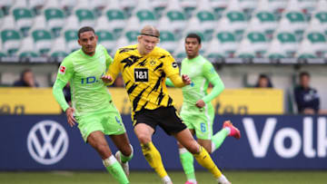 Maxence Lacroix and Erling Haaland vie for the ball (Photo by RONNY HARTMANN/AFP via Getty Images)
