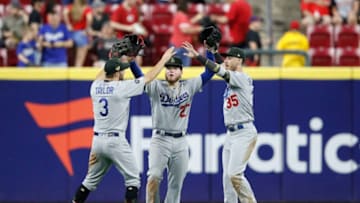 CINCINNATI, OH - MAY 17: Chris Taylor #3, Alex Verdugo #27 and Cody Bellinger #35 of the Los Angeles Dodgers celebrate after the game against the Cincinnati Reds at Great American Ball Park on May 17, 2019 in Cincinnati, Ohio. The Dodgers won 6-0. (Photo by Joe Robbins/Getty Images)
