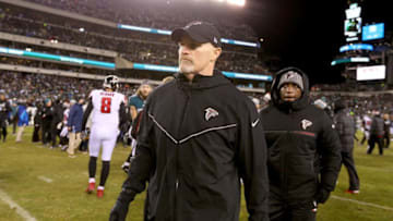 PHILADELPHIA, PA - JANUARY 13: Head coach Dan Quinn of the Atlanta Falcons walks off the field after being defeating by the Atlanta Falcons with a score of 10 to 15 in the NFC Divisional Playoff game at Lincoln Financial Field on January 13, 2018 in Philadelphia, Pennsylvania. (Photo by Mitchell Leff/Getty Images)