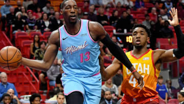 Miami Heat center Bam Adebayo (13) passes the ball away from Utah Jazz guard Donovan Mitchell (45)(Jasen Vinlove-USA TODAY Sports)