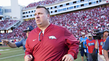 FAYETTEVILLE, AR - SEPTEMBER 3: Head Coach Bret Bielema of the Arkansas Razorbacks jogs onto the field after a game against the Louisiana Tech Bulldogs at Razorback Stadium on September 3, 2016 in Fayetteville, Arkansas. The Razorbacks defeated the Bulldogs 21-20. (Photo by Wesley Hitt/Getty Images)