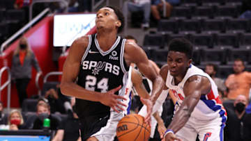 Devin Vassell #24 of the San Antonio Spurs gets the ball knocked away by Hamidou Diallo #6 of the Detroit Pistons (Photo by Gregory Shamus/Getty Images)