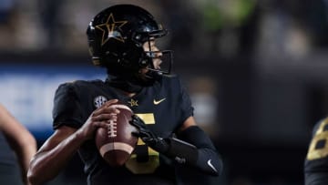 Nov 13, 2021; Nashville, TN, USA; Vanderbilt quarterback Mike Wright (5) throws a pass against Kentucky during the fourth quarter at Vanderbilt Stadium Saturday, Nov. 13, 2021 in Nashville, Tenn. Mandatory Credit: George Walker IV-USA TODAY Sports