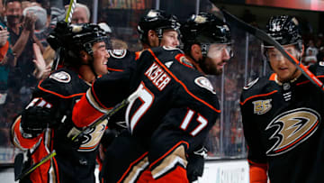 ANAHEIM, CA - OCTOBER 10: Kiefer Sherwood #64, Ryan Kesler #17, and Brandon Montour #26 of the Anaheim Ducks celebrate Kesler's first period goal during the game against the Arizona Coyotes on October 10, 2018 at Honda Center in Anaheim, California. (Photo by Debora Robinson/NHLI via Getty Images)