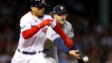 BOSTON, MA - OCTOBER 14: Gerrit Cole #45 of the Houston Astros throws out Mookie Betts #50 of the Boston Red Sox during the fourth inning in Game Two of the American League Championship Series at Fenway Park on October 14, 2018 in Boston, Massachusetts. (Photo by Maddie Meyer/Getty Images)