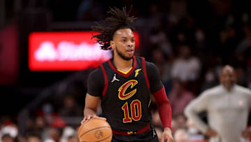 Feb 15, 2022; Atlanta, Georgia, USA; Cleveland Cavaliers guard Darius Garland (10) dribbles up the court during the second quarter against the Atlanta Hawks at State Farm Arena. Mandatory Credit: Jason Getz-USA TODAY Sports