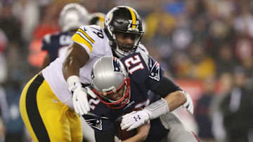 FOXBORO, MA - JANUARY 22: Tom Brady #12 of the New England Patriots is sacked by Javon Hargrave #79 of the Pittsburgh Steelers during the first quarter of the AFC Championship Game at Gillette Stadium on January 22, 2017 in Foxboro, Massachusetts. (Photo by Patrick Smith/Getty Images)