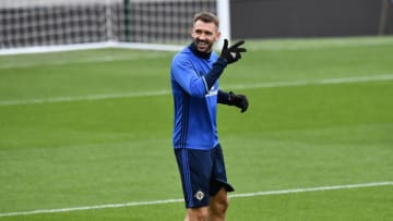 BELFAST, NORTHERN IRELAND - OCTOBER 04: Gareth McAuley jokes with team mates during the Northern Ireland international football squad training session at Windsor Park on October 4, 2017 in Belfast, Northern Ireland. Northern Ireland play Germany in a 2018 World Cup group C qualifier tomorrow evening. (Photo by Charles McQuillan/Getty Images)